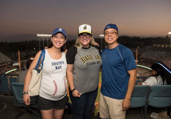 Three Cal State LA alumni at Dodger Night